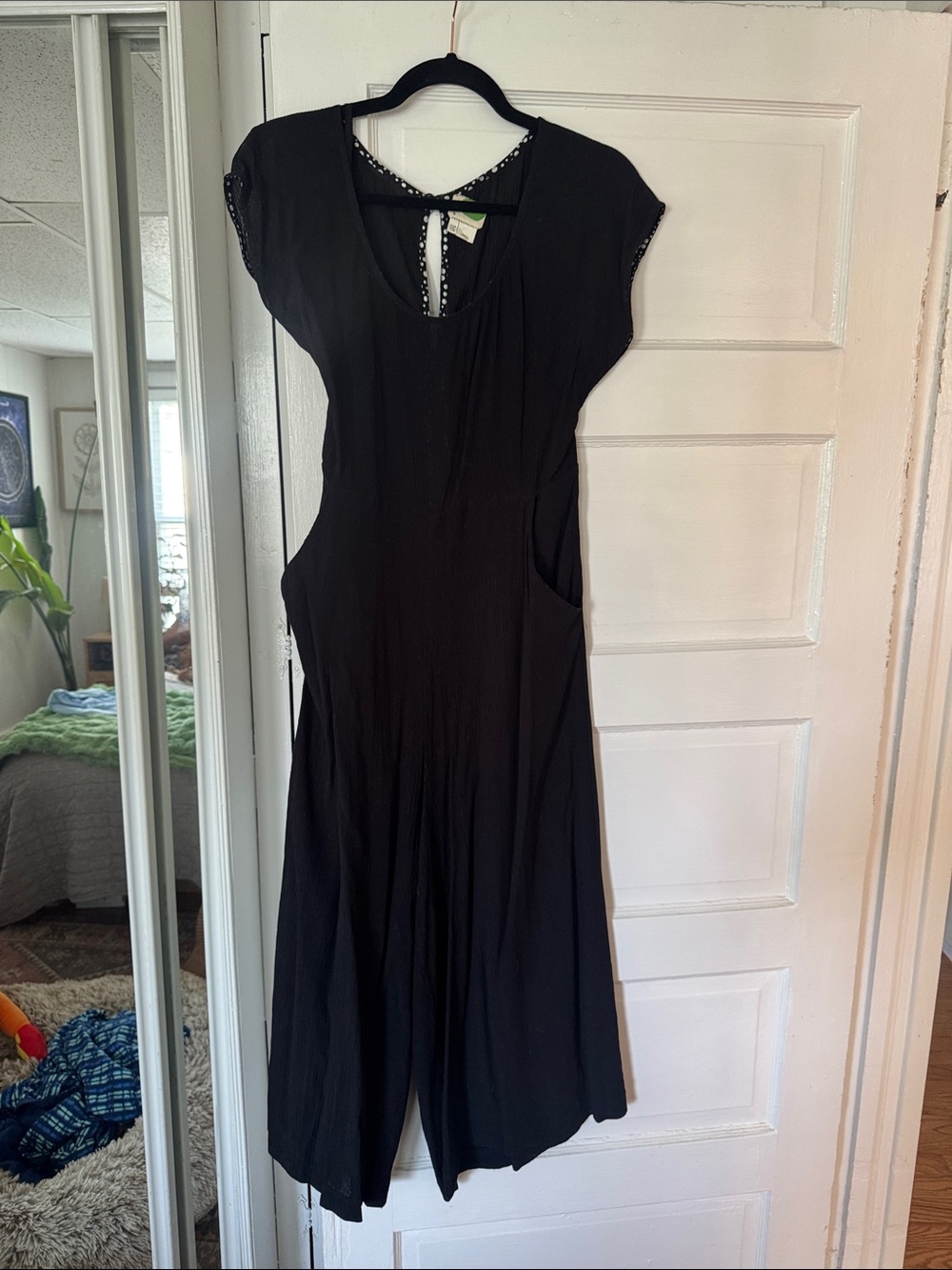 Anthropologie Black Short-Sleeve Jumpsuit with Scoop Neck and Back Tie